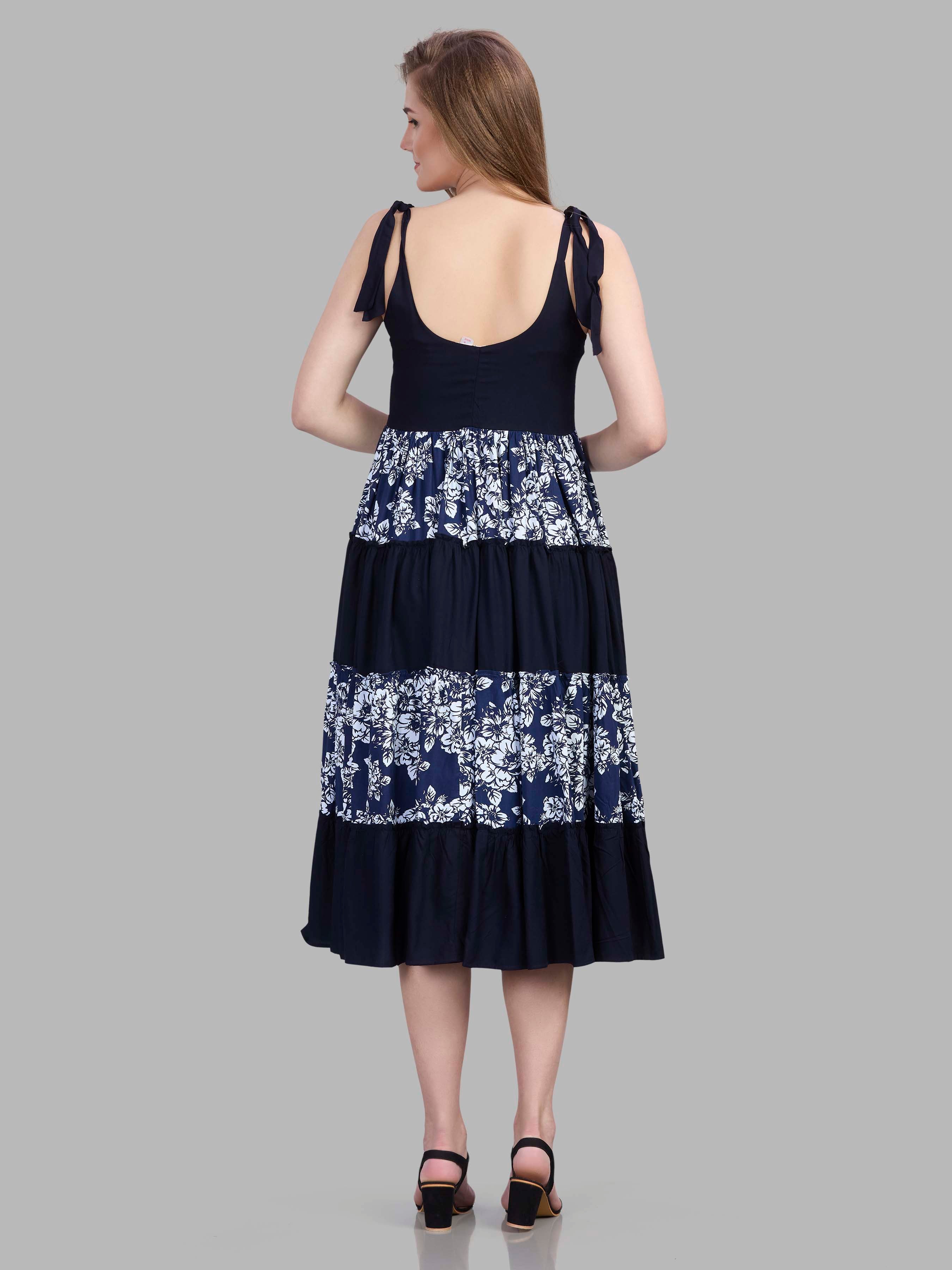Viscose navy blue sleeveless tiered dress with floral print tiers