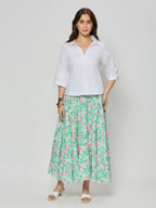 White cotton satin textured top with skirt.