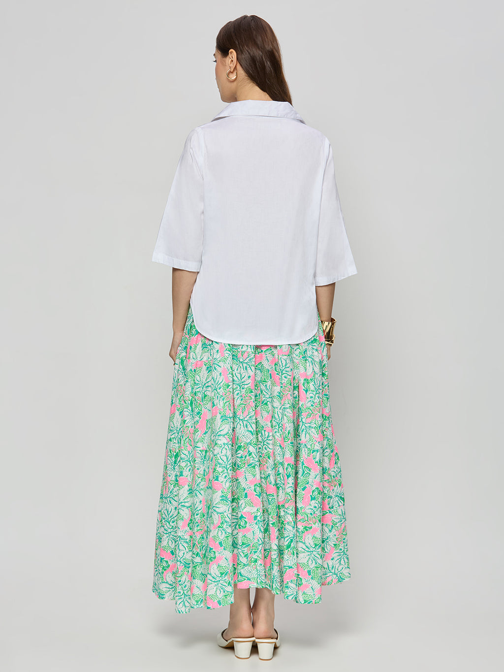 White cotton satin textured top with skirt.