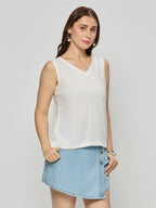 Viscose sleeveless top with bow.