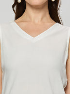 Viscose sleeveless top with bow.